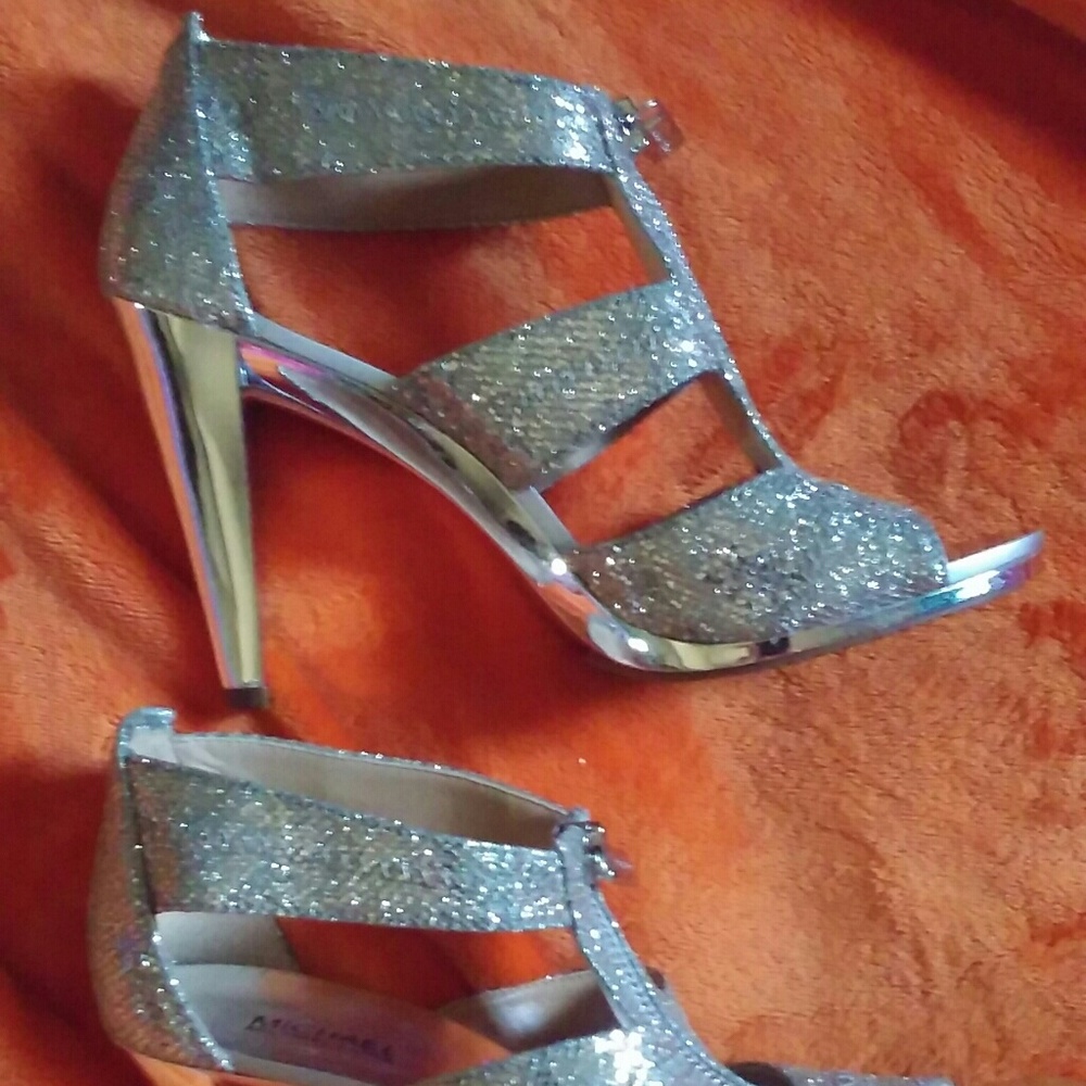 Michael Kors silver pumps.  New